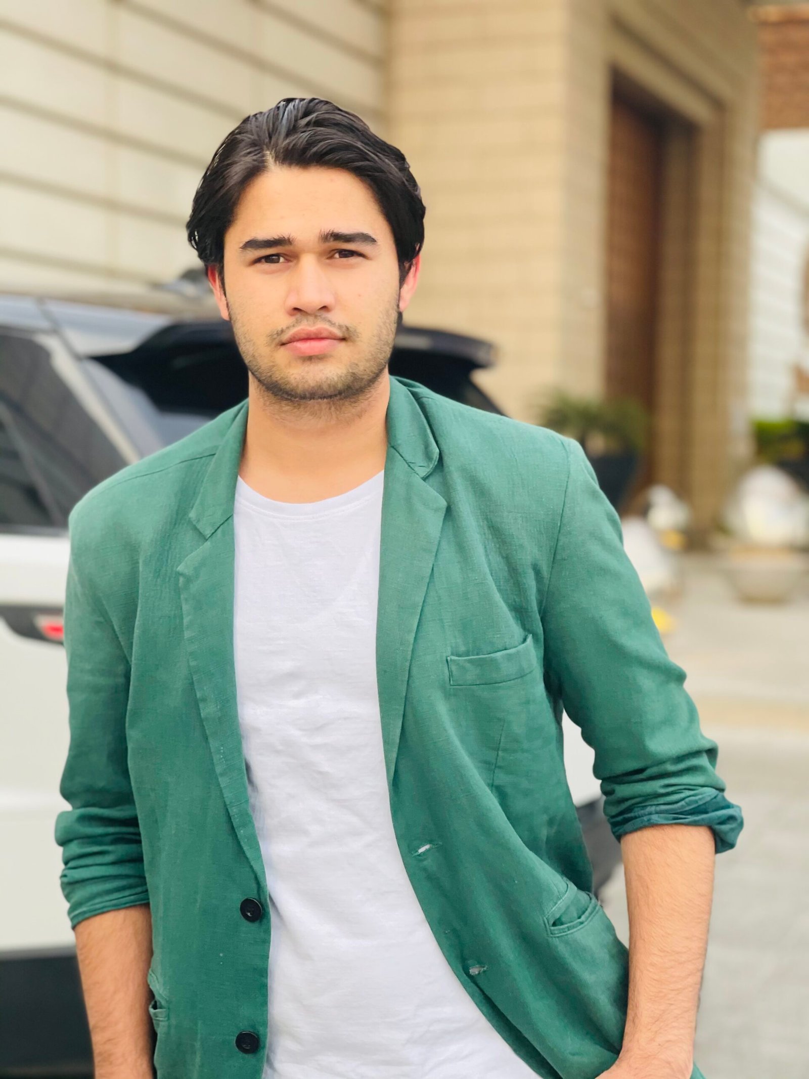portrait young man standing city scaled